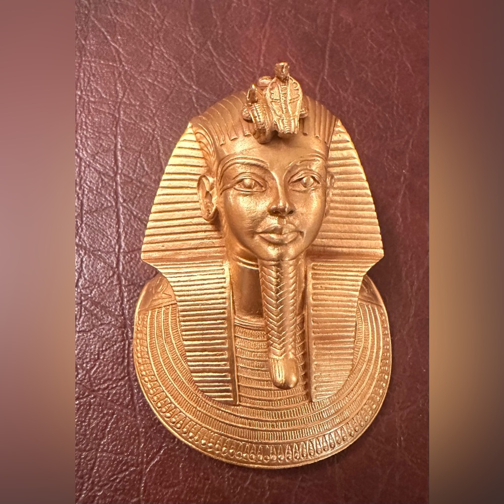 Gold plated King Tut mask pendant on plexiglass stand, 1976, Vintage